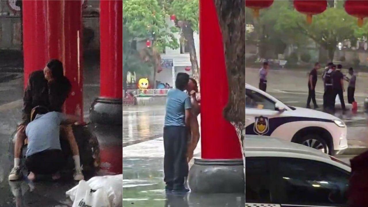 雨中五指山三月三广场小情侣旁若无人拥吻缠绵 男的竟钻进女裙底！封面图