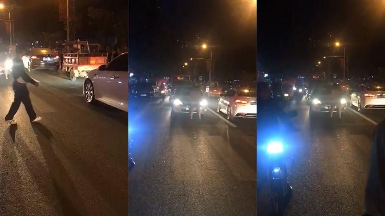 史上最魔幻新闻 四川广元一对男女在马路中间车震 车前盖成二人炮房 引路人疯狂围观封面图